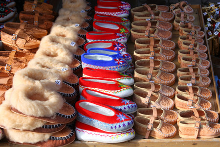Traditional polish leather mountain boots for children called 'kierpce' on outdoor marketのeditorial素材