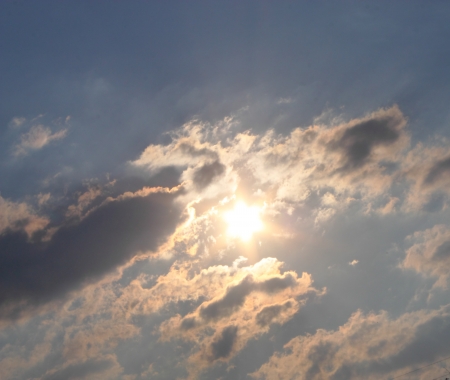 Sun in the cloudy sky