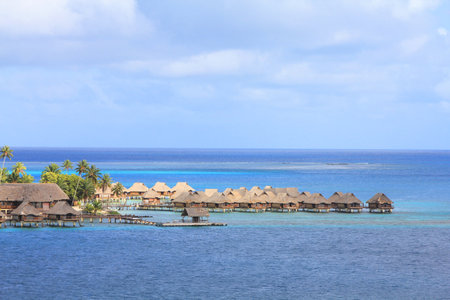 Bungalows on tropical Bora Bora island. Blue Pacific ocean のeditorial素材