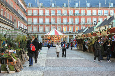 MADRID, SPAIN - DECEMBER 5   Christmas market stalls on Plaza Mayor December 5, 2012 in Madrid Spain  Grand Christmas Market is a popular attraction for tourists and locals in Decemberのeditorial素材