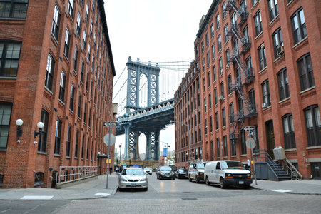 NEW YORK CITY - OCTOBER 15, 2014: Manhattan bridge view from Brooklyn Dumbo neighborhood. Manhattan Bridge connects boroughs of Manhattan and Brooklyn over East Riverのeditorial素材