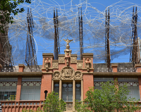 BARCELONA, SPAIN - AUGUST 9, 2015 : Sculpture of Antoni Tapies on the top of the Fundacio Antoni Tapies building. The museum is located in Carrer d'Aragoのeditorial素材
