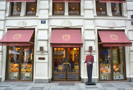 VIENNA, AUSTRIA - MAY 03, 2016 : Entrance to the Hotel Sacher cafe. Cafe Sacher is famous for its original chocolate Sacher Torte cakeのeditorial素材