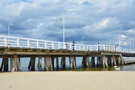 SOPOT, POLAND - JUNE 26, 2015 : Beach and pier 'molo' in Sopot, a seaside resort on the coast of Baltic Seaのeditorial素材