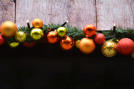 Christmas garland with baubles and lightsの写真素材