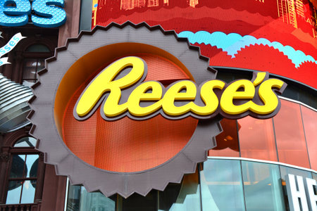 LAS VEGAS, USA - MARCH 22, 2018 : Reese's logo at the entrance of Hershey's Chocolate World. New York New York hotel and casino facade.のeditorial素材