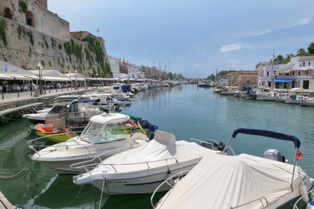 CIUTADELLA, MENORCA, SPAIN - AUGUST 13, 2018 : Sea port in old town of Ciutadella on Menorca island.のeditorial素材