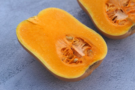 Freshly cut butternut squash. autumn food.の写真素材