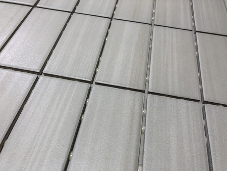 Gray linear tile used for wall or floor kitchen or bathroom remodelingの写真素材