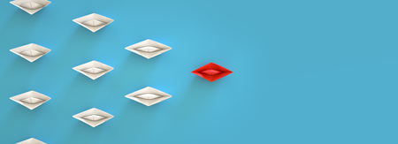 paper boat leadership concept - red paper boat leading the rowの写真素材