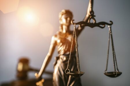 Statue of lady justice on bright background - Side view with copy space.の写真素材