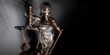 Statue of lady justice on bright background - Side view with copy space.の写真素材