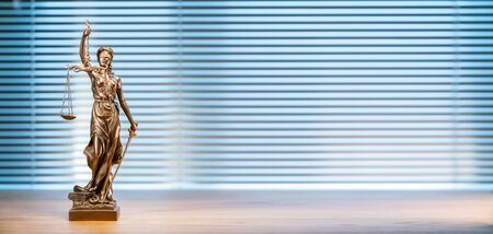 Statue of lady justice on bright background - Side view with copy space.の写真素材