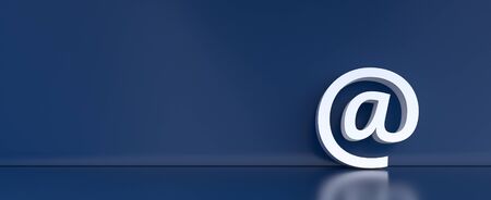 email app icon against a colored wall - communication concept for contact and service use. copy space for individual text.の写真素材