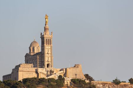 Marseille under the protection of Our Lady of the Guard on the hill overlooking the cityの写真素材