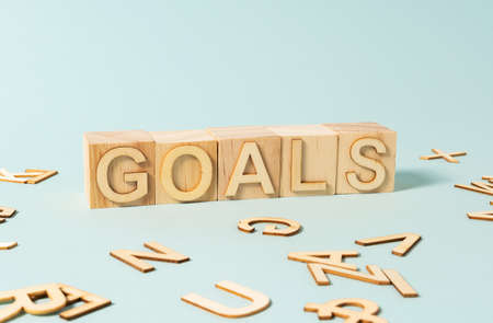 GOALS word on wooden cubes on the light blue backgroundの写真素材
