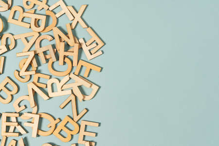 wooden letter all over the blue backgroundの写真素材