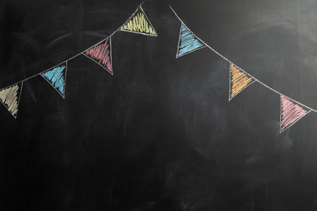 Image of birthday hanger drawn on chalk board. Chalk board background.の写真素材