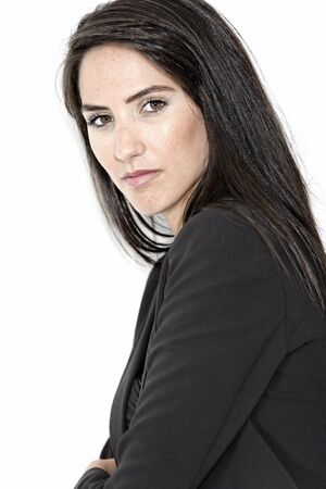 Professional working woman in corporate business clothes with a serious lookの写真素材
