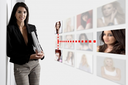 Professional business woman with a networking concept of friends and colleagues.の写真素材