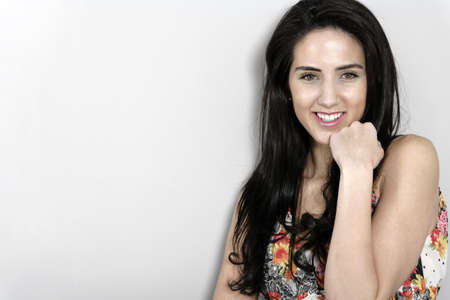 Beautiful young woman in a summer dressの写真素材