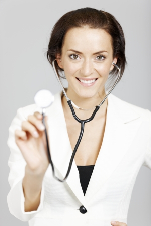 Helpful young doctor with stethoscope.の写真素材