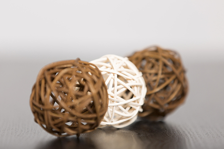 Three wicker balls together in a stylish designの写真素材