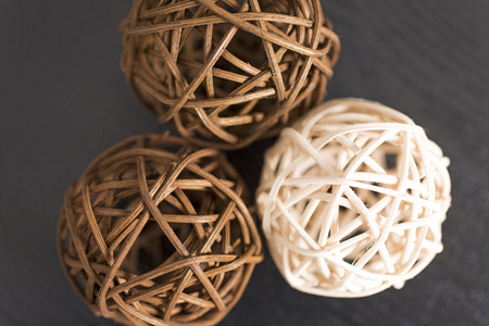Three wicker balls together in a stylish designの写真素材