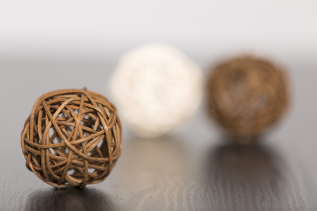 Three wicker balls together in a stylish designの写真素材