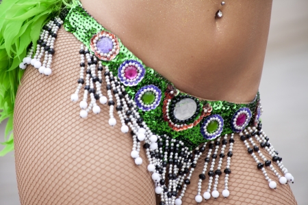 Woman dancing samba in a fancy costume