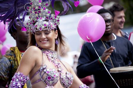 WARSAW, POLAND, September 8: Unidentified Carnival dancers on the 15th Pink Ribbon Walk against the Breast Cancer september 8, 2012 in Warsaw, Poland. のeditorial素材