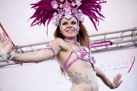 WARSAW, POLAND, September 8: Unidentified Carnival dancers on the 15th Pink Ribbon Walk against the...