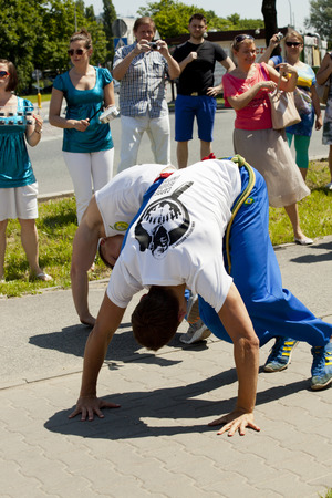 WARSAW, POLAND, june 8: Unidentified capoeira dancers on the XII Brazilian Festival on June 8, 2014 in Warsaw, Poland.のeditorial素材