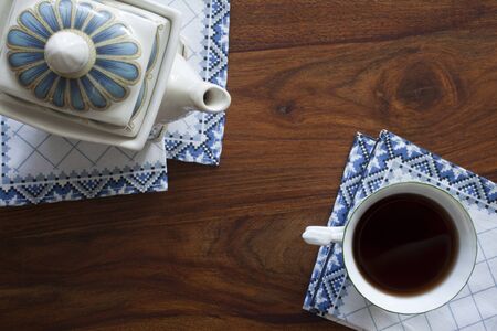 tea cup on wooden tableの写真素材