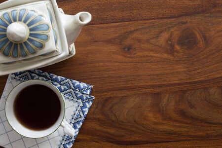 tea cup on wooden tableの写真素材