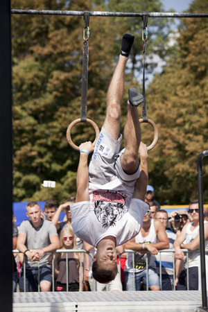 WARSAW, POLAND - AUGUST 20: Unidentified athlete performs during Street Workout Poland Championships on August 20, 2016 in Warsaw.のeditorial素材