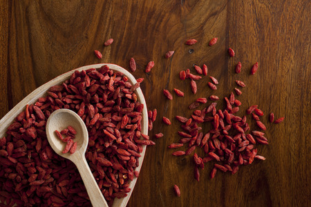 Goji berries on the wooden table