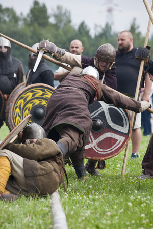 DROHICZYN, POLAND, July 8:  Medieval warriors during the fight on Vikings, Baltics and Slavic warriors meeting on July 8,  2017 in Drohiczyn, Poland.のeditorial素材