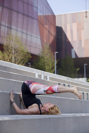 Woman doing outdoor workout in the cityの写真素材