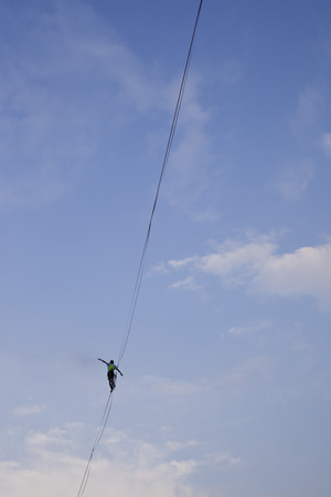 Warsaw, Poland- September 9, 2018: equilibrist walking on the rope above the Vistula river during Vistula Festのeditorial素材