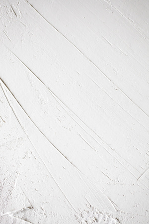 old and scratched plaster backgroundの写真素材