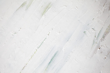 old and scratched plaster backgroundの写真素材