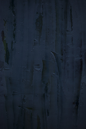 old and scratched plaster backgroundの写真素材