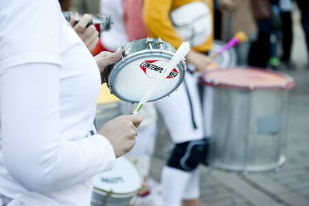 Warsaw, May 1, 2019,- Musicians playing on drums during a street parade on May 1, 2019 in Warsaw,...