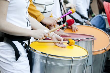 Warsaw, May 1, 2019,- Musicians playing on drums during a street parade on May 1, 2019 in Warsaw,...