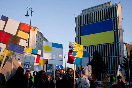 Warsaw, Poland, March 20 2022. artistic protest against the war in ukraine with big ukrainian flag...