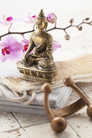 Massage accessories with Buddha for spirituality is pure backgroundの写真素材