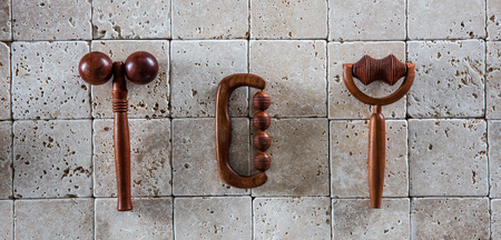 still life of body stimulating rollers and energy massage tools for background or wallpaper of...