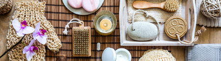 beauty still life wallpaper with many healthy body care accessories, zen flowers and candle for...