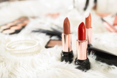 Different bright lipsticks on dressing table.の写真素材